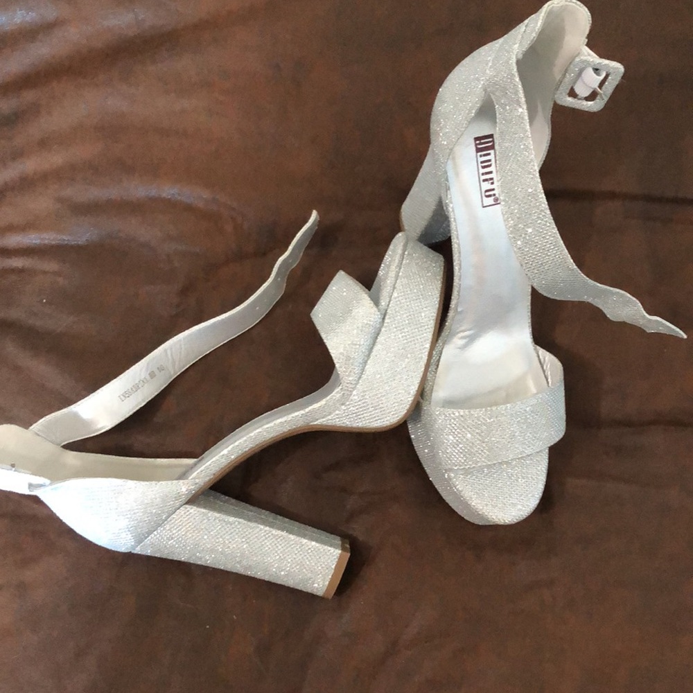 Never worn platform heels, silver iridescent